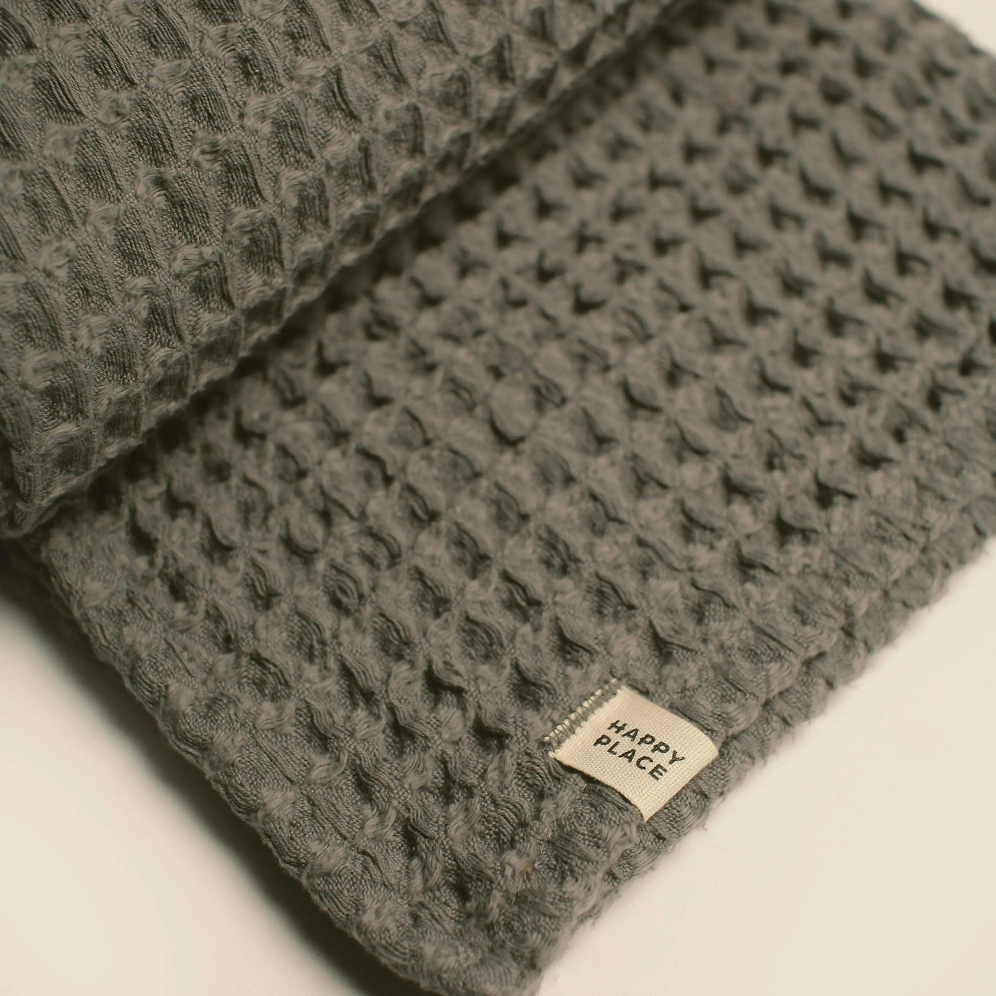 The Weightless Waffle Throw Baby Blanket - Coal